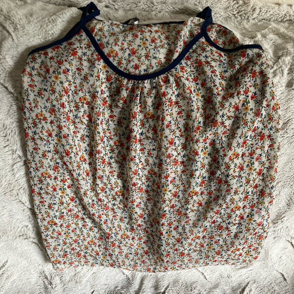 Sheer floral tank with navy trim neckline and straps. Size S Papaya